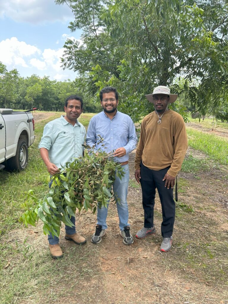 Joshua with Vivek Bist, ANR Agent and Dr. Apurba Barman, UGA Pecan Extension Entomologist