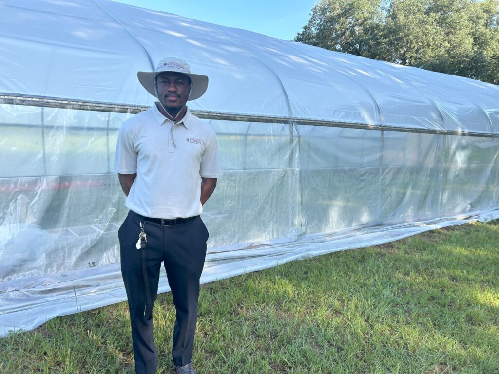 Joshua at a green house
